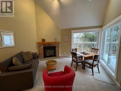 160 - 51 Trott Boulevard, Collingwood, ON - Indoor Photo Showing Living Room With Fireplace