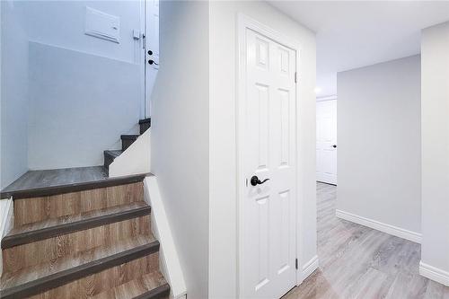 Stairs to laundry room and in law suite - 44 Welbourn Drive, Hamilton, ON - Indoor Photo Showing Other Room