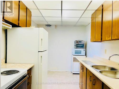 701 - 335 Driftwood Avenue, Toronto (Black Creek), ON - Indoor Photo Showing Kitchen With Double Sink