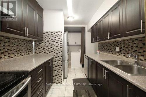 711 - 340 Dixon Road, Toronto (Kingsview Village-The Westway), ON - Indoor Photo Showing Kitchen With Double Sink