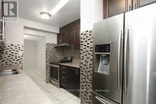 711 - 340 Dixon Road, Toronto (Kingsview Village-The Westway), ON - Indoor Photo Showing Kitchen With Stainless Steel Kitchen With Double Sink With Upgraded Kitchen