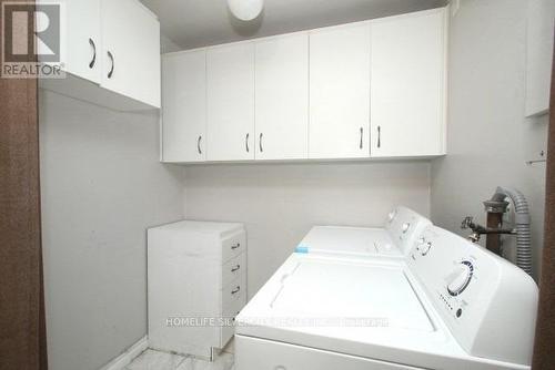 711 - 340 Dixon Road, Toronto (Kingsview Village-The Westway), ON - Indoor Photo Showing Laundry Room