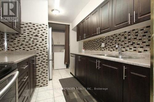 711 - 340 Dixon Road, Toronto (Kingsview Village-The Westway), ON - Indoor Photo Showing Kitchen With Double Sink