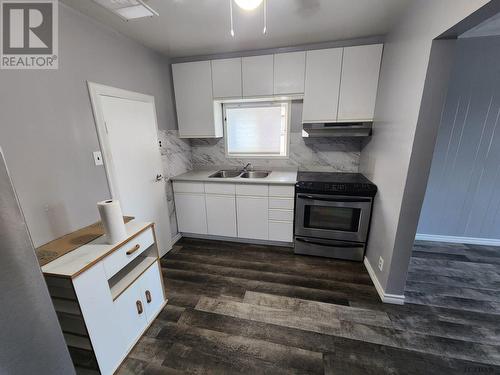 421 Birch Street S, Timmins (Timmins South - East), ON - Indoor Photo Showing Kitchen With Double Sink