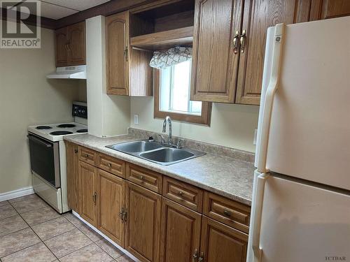 23-25 Aura Lake St, Timmins, ON - Indoor Photo Showing Kitchen With Double Sink