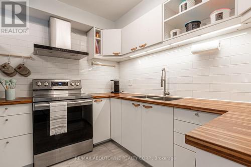 3 - 4199 Longmoor Drive, Burlington (Shoreacres), ON - Indoor Photo Showing Kitchen With Double Sink