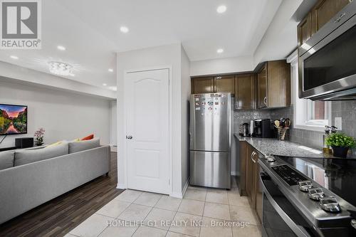 30 - 2500 Post Road, Oakville (Uptown Core), ON - Indoor Photo Showing Kitchen With Double Sink