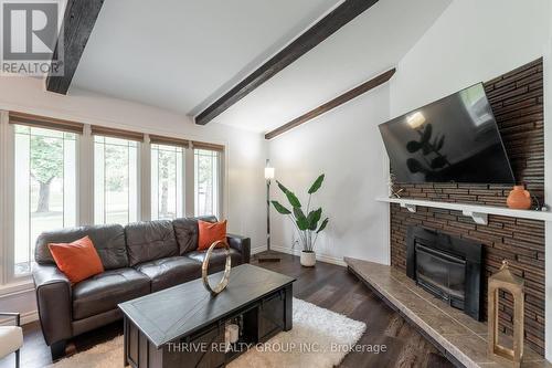 221 Merlin Crescent, London, ON - Indoor Photo Showing Living Room With Fireplace