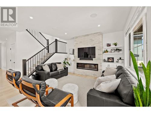 4271 Russo Street, Kelowna, BC - Indoor Photo Showing Living Room With Fireplace