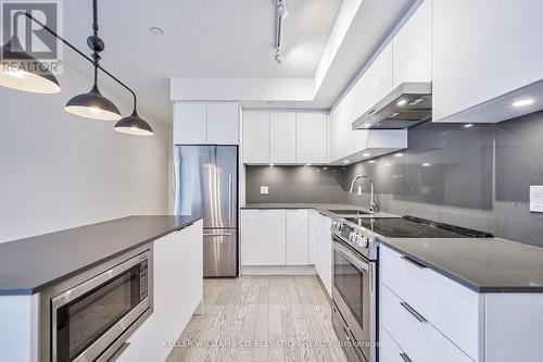 423 - 25 Richmond Street E, Toronto (Church-Yonge Corridor), ON - Indoor Photo Showing Kitchen With Upgraded Kitchen