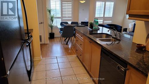 409 - 10 Mendelssohn Street, Toronto (Clairlea-Birchmount), ON - Indoor Photo Showing Kitchen With Double Sink