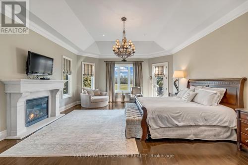 5100 14 Side Road, Milton (Nelson), ON - Indoor Photo Showing Bedroom With Fireplace