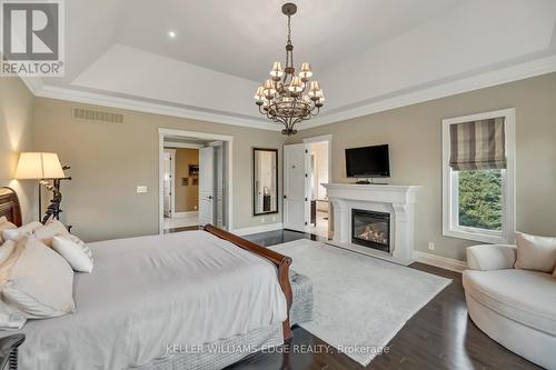 5100 14 Side Road, Milton (Nelson), ON - Indoor Photo Showing Bedroom With Fireplace