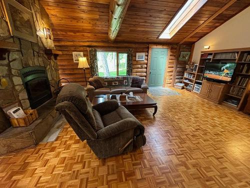 1980 Snowball Creek Road, Grand Forks, BC - Indoor Photo Showing Living Room With Fireplace