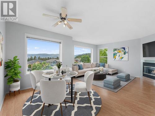 3559 Glen Eagles Court, West Kelowna, BC - Indoor Photo Showing Dining Room With Fireplace