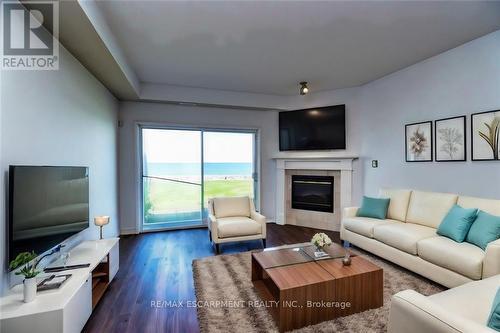 15 - 484 Millen Road, Hamilton (Lakeshore), ON - Indoor Photo Showing Living Room With Fireplace