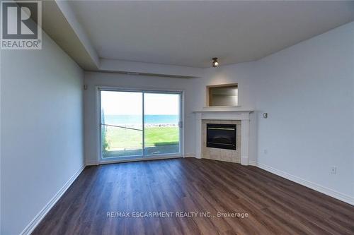 15 - 484 Millen Road, Hamilton (Lakeshore), ON - Indoor Photo Showing Living Room With Fireplace