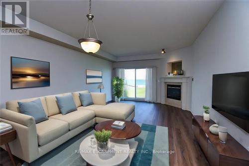 15 - 484 Millen Road, Hamilton (Lakeshore), ON - Indoor Photo Showing Living Room With Fireplace