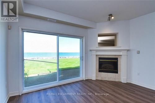 15 - 484 Millen Road, Hamilton (Lakeshore), ON - Indoor Photo Showing Living Room With Fireplace