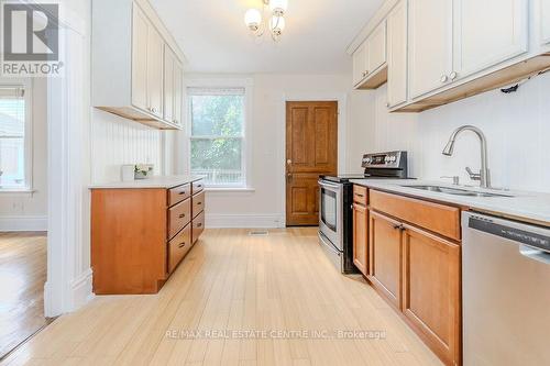 13 Extra Street, Guelph (Exhibition Park), ON - Indoor Photo Showing Kitchen With Double Sink