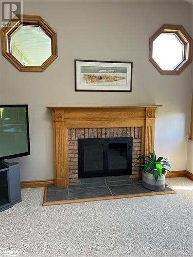 2332 Centre Line, Clearview, ON - Indoor Photo Showing Living Room With Fireplace