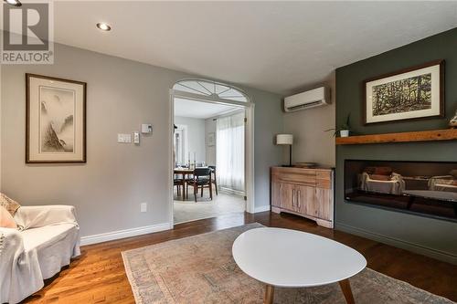 87 Chiasson, Dieppe, NB - Indoor Photo Showing Living Room With Fireplace