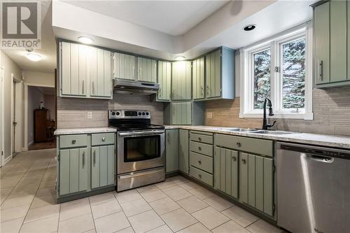 87 Chiasson, Dieppe, NB - Indoor Photo Showing Kitchen With Double Sink