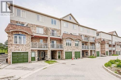 109 - 200 Mclevin Avenue, Toronto (Malvern), ON - Outdoor With Facade