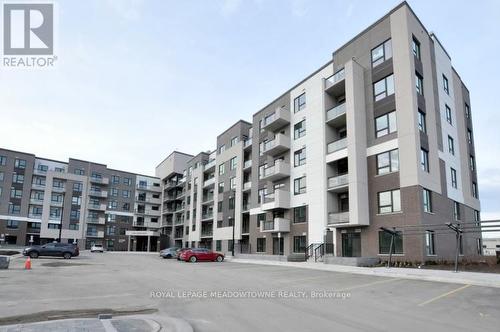 128 - 1105 Leger Way, Milton (Ford), ON - Outdoor With Facade