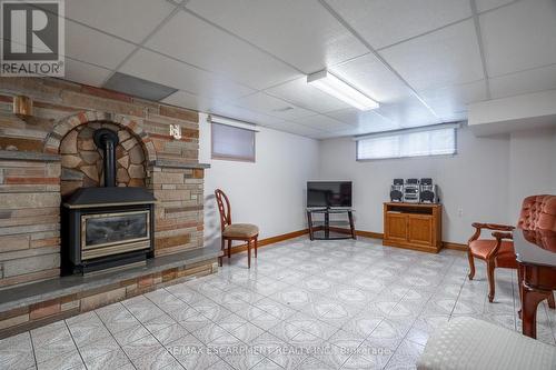 159 West 26Th Street, Hamilton (Westcliffe), ON - Indoor Photo Showing Basement With Fireplace