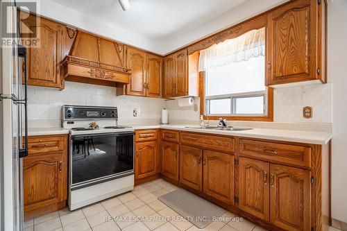 159 West 26Th Street, Hamilton, ON - Indoor Photo Showing Kitchen With Double Sink