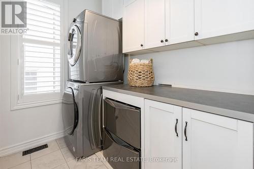 19 Cameron Street, Springwater (Centre Vespra), ON - Indoor Photo Showing Laundry Room