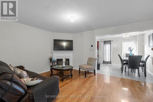 22 Tanasi Road, Brampton (Credit Valley), ON - Indoor Photo Showing Living Room With Fireplace