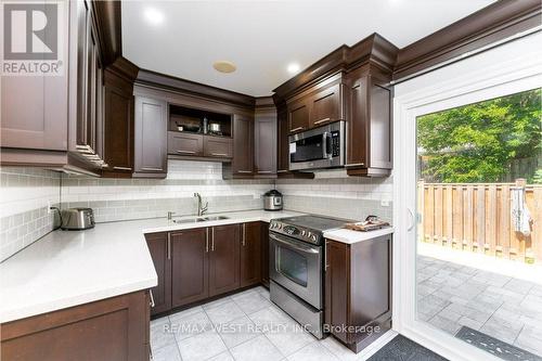 72 - 7080 Copenhagen Road, Mississauga (Meadowvale), ON - Indoor Photo Showing Kitchen With Double Sink