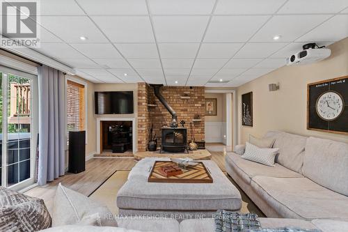 7470 Bamsey Drive, Hamilton Township (Bewdley), ON - Indoor Photo Showing Living Room With Fireplace