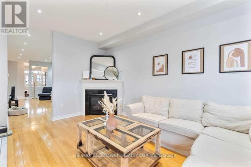 Upper - 128 Breton Avenue, Mississauga, ON - Indoor Photo Showing Living Room With Fireplace