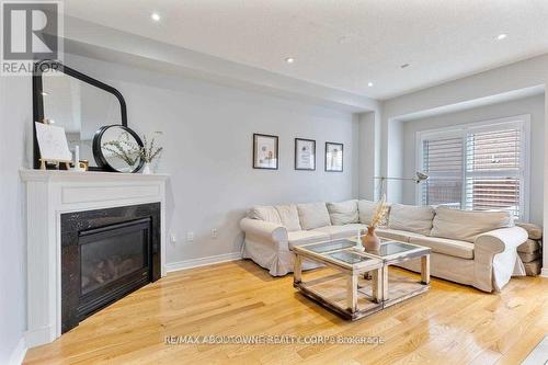 Upper - 128 Breton Avenue, Mississauga, ON - Indoor Photo Showing Living Room With Fireplace