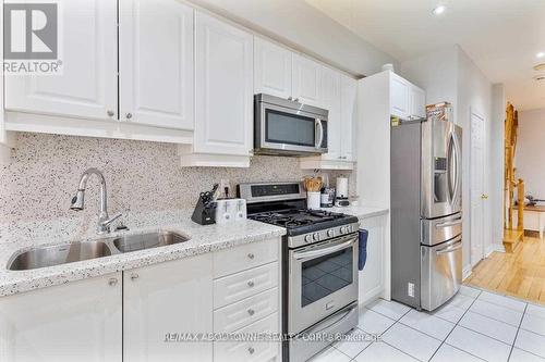 Upper - 128 Breton Avenue, Mississauga, ON - Indoor Photo Showing Kitchen With Stainless Steel Kitchen With Double Sink