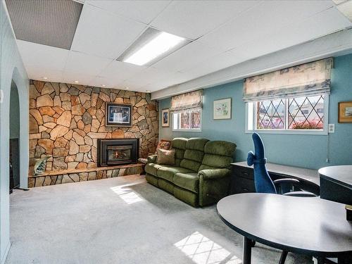 1731 Barrett Drive, Fruitvale, BC - Indoor With Fireplace