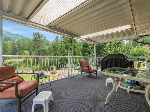 1731 Barrett Drive, Fruitvale, BC - Outdoor With Deck Patio Veranda With Exterior