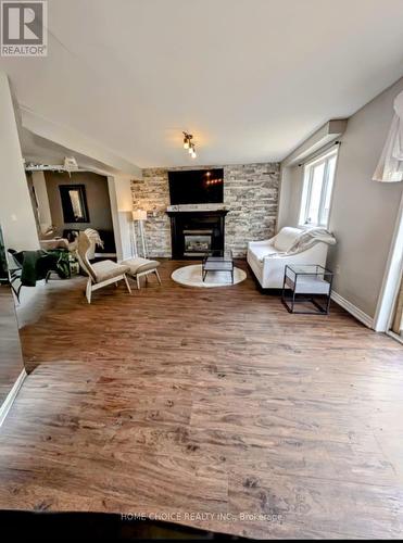 14 Snowy Owl Crescent, Barrie (Little Lake), ON - Indoor Photo Showing Living Room With Fireplace