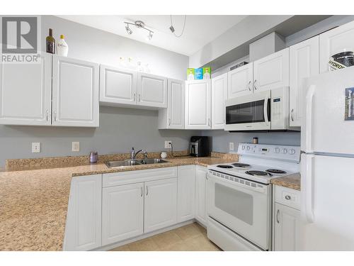 770 Rutland Road N Unit# 307, Kelowna, BC - Indoor Photo Showing Kitchen With Double Sink