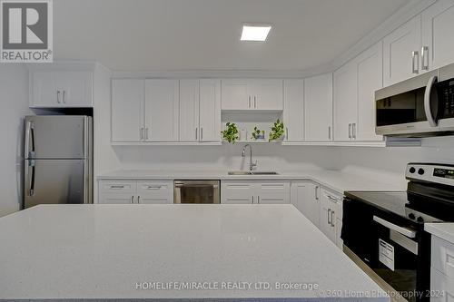 1404 - 100 Wingarden Court, Toronto (Malvern), ON - Indoor Photo Showing Kitchen With Double Sink