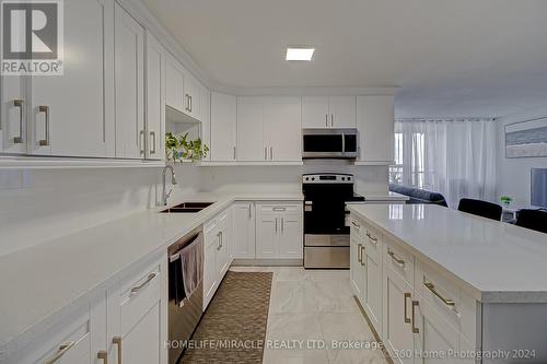 1404 - 100 Wingarden Court, Toronto (Malvern), ON - Indoor Photo Showing Kitchen With Double Sink