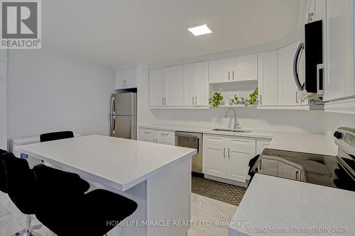 1404 - 100 Wingarden Court, Toronto (Malvern), ON - Indoor Photo Showing Kitchen With Double Sink