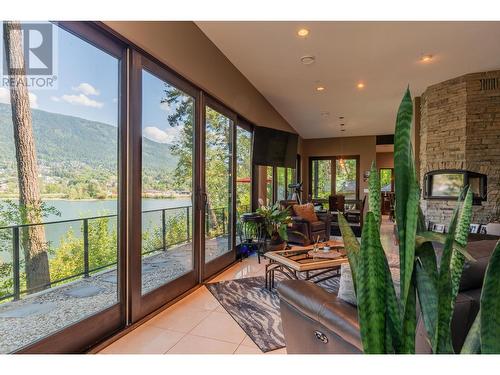 59 Johnstone  Road, Nelson, BC -  With Body Of Water With Exterior