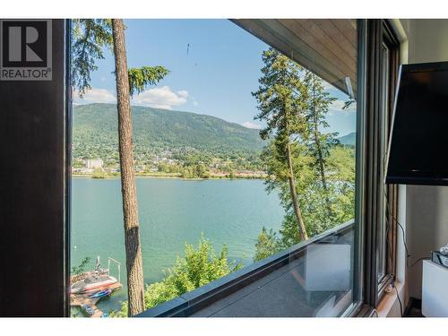 59 Johnstone  Road, Nelson, BC - Outdoor With Body Of Water With View