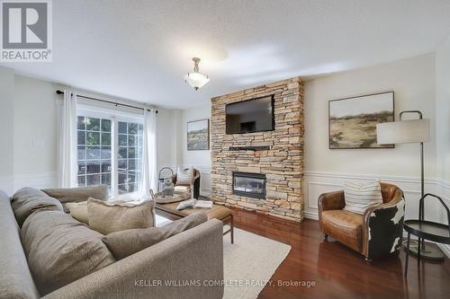 1228 Hammond Street, Burlington (Lasalle), ON - Indoor Photo Showing Living Room With Fireplace