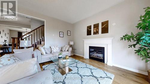 76 Roelfson Drive, Hamilton (Meadowlands), ON - Indoor Photo Showing Living Room With Fireplace