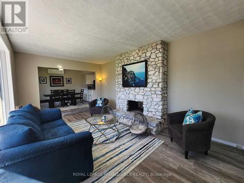 1460 Wallbridge Loyalist Road, Belleville, ON - Indoor Photo Showing Living Room With Fireplace